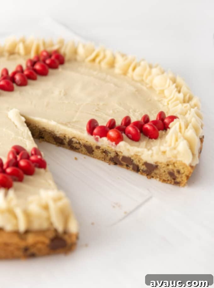 Homerun Hero Cookie Cake 7 Sliced baseball cookie cake on a serving plate, showing the chewy texture.