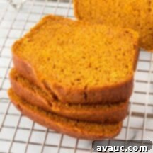 A delicious slice of Copycat Starbucks Pumpkin Loaf, showcasing its moist texture and perfect golden-brown crust.