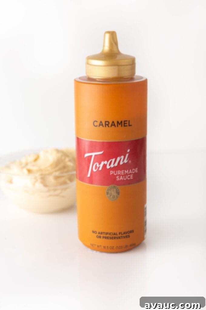Decadent Chewy Butterscotch Chip Cookie Cake 4 Bottle of Torani Puremade Caramel Sauce, a key ingredient for the frosting and drizzle.