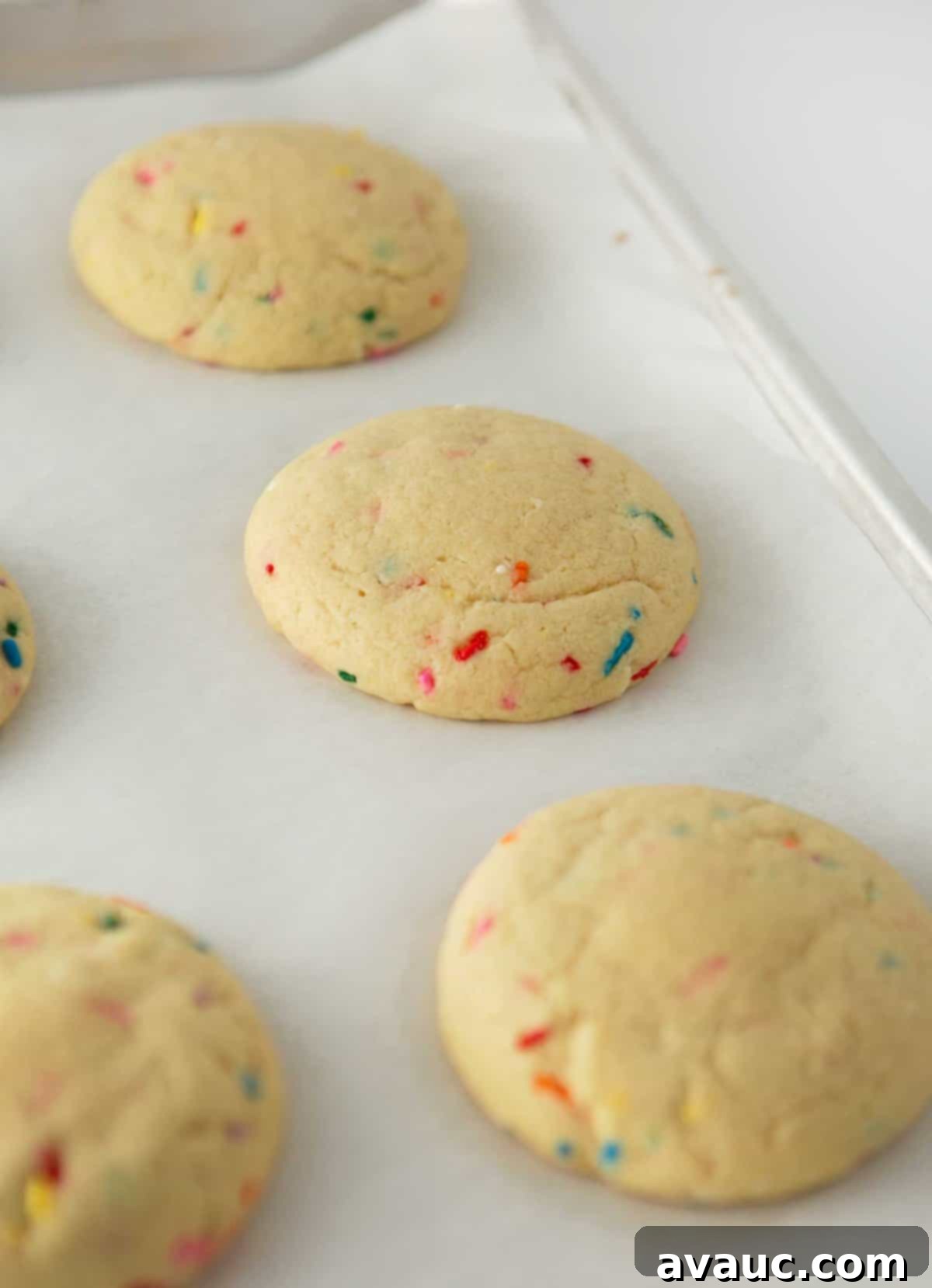 Frosted Funfetti Cookies 7 baked birthday cake cookies on sheet pan