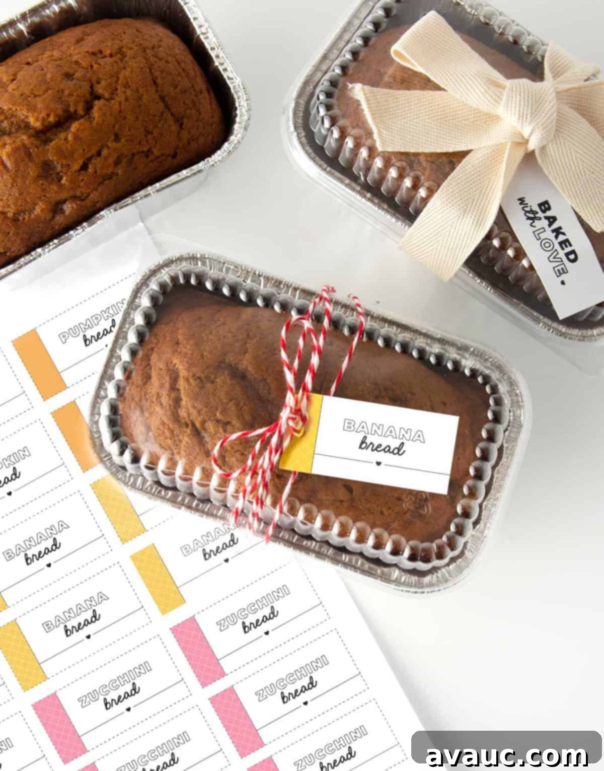 Five Creative Ways to Gift Banana Bread Includes Free Printables 2 Mini foil loaf pans with banana bread and gift tag wrapped around that says "banana bread"