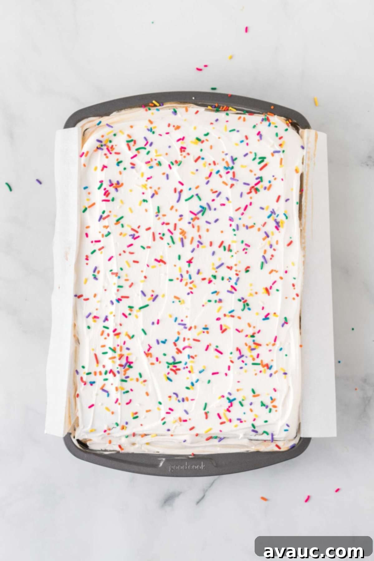 Dreamy Ice Cream Sandwich Cake 15 Overhead view of finished ice cream sandwich cake in pan, ready for freezing