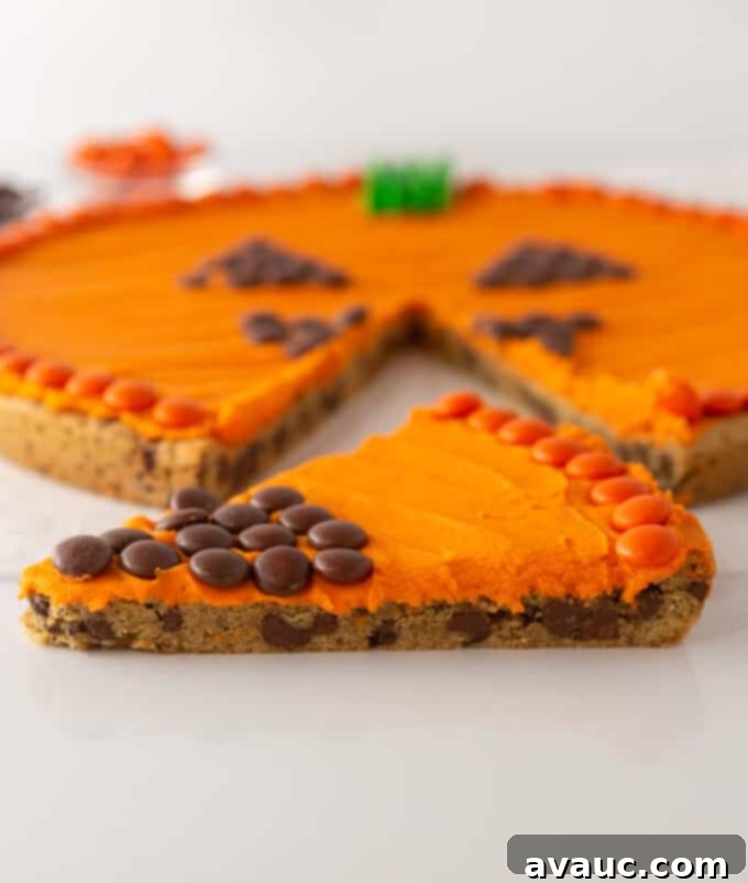 Spooktacular Easy Pumpkin Cookie Cake 9 slice of orange cookie cake