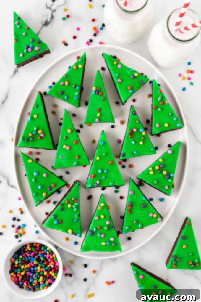 Celestial Christmas Brownie Trees 2 white platter of green triangle Little Debbie cosmic Christmas tree brownies