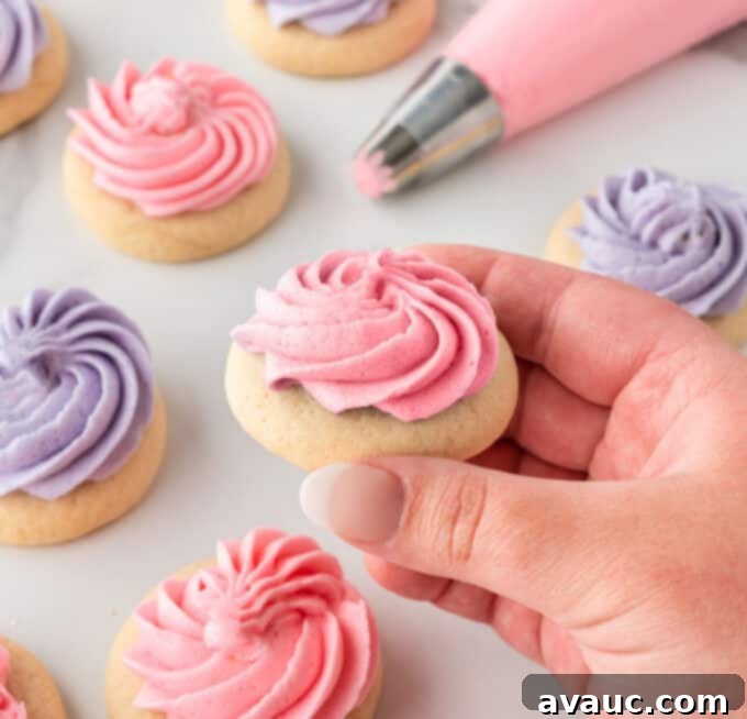 Bite-Sized Sugar Cookies 3 hand holding pink mini sugar cookie