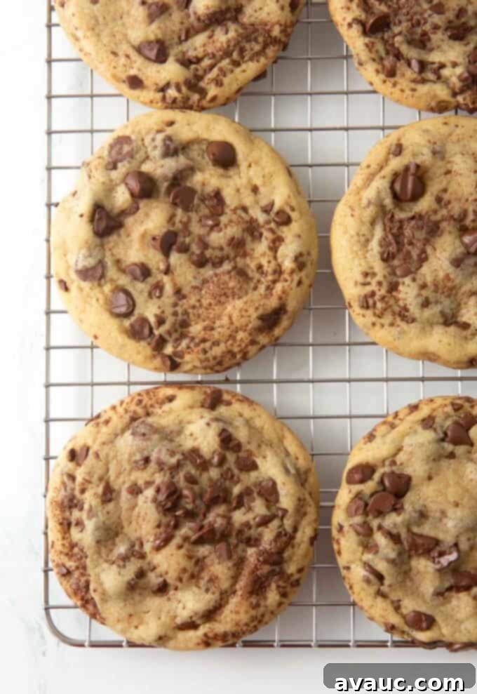 bakery style chocolate chip cookies on cooling rack