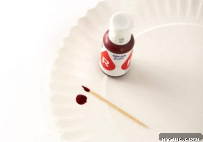 coloring white frosting pink with gel food coloring
