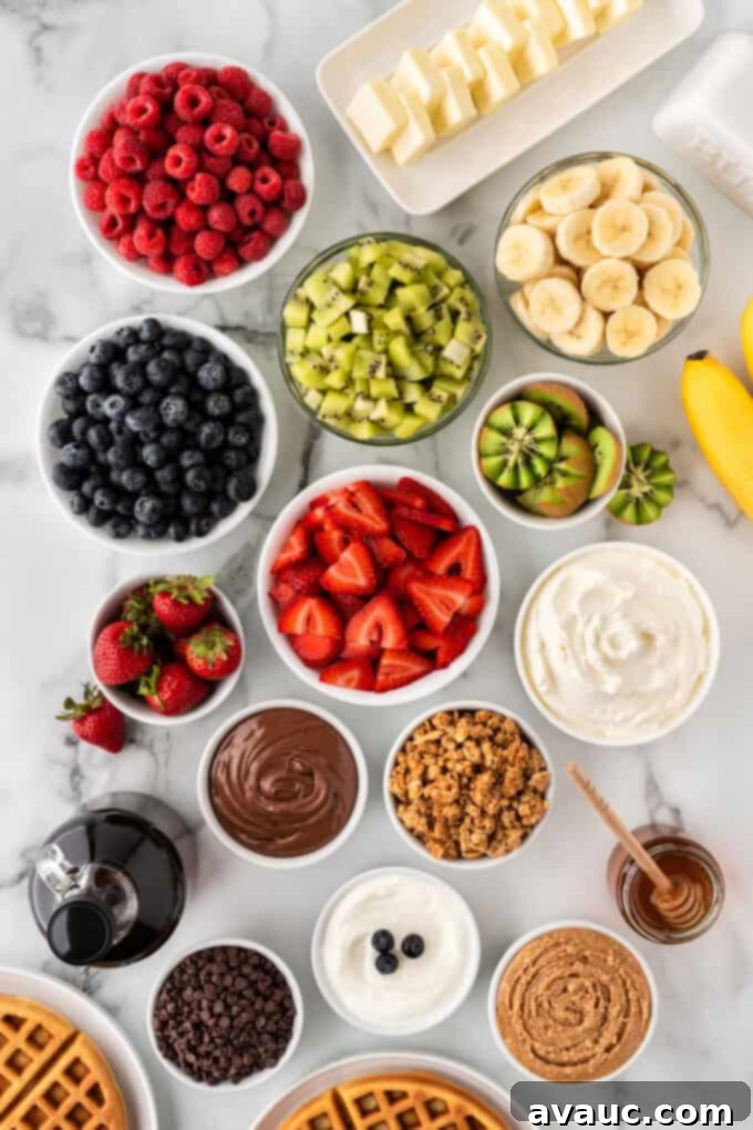 assortment of waffle bar topping ideas, including fresh fruit, syrup, and whipped cream on a table