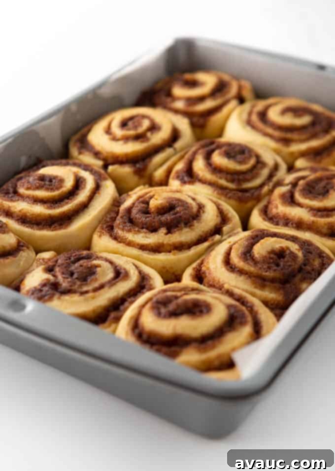 One-Hour Citrus Cinnamon Buns 15 Pan of baked orange cinnamon rolls