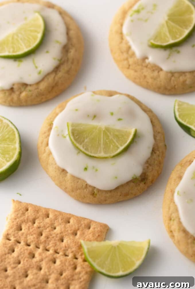 chewy key lime cookies with glaze and lime wedge