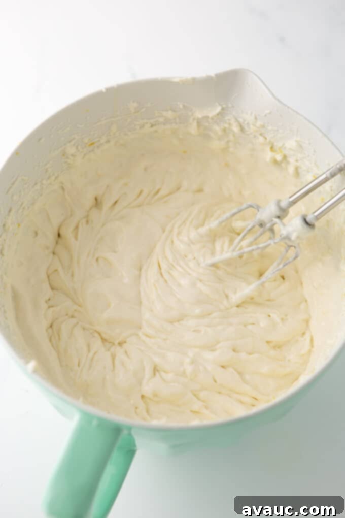 Easy No Bake Lemon Cheesecake Squares 10 bowl of no bake cheesecake filling after mixing