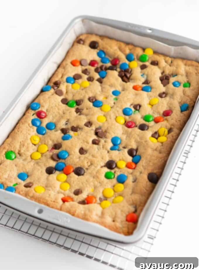 Kitchen Sink Cookie Bars 7 9x13 pan of baked monster cookie bars