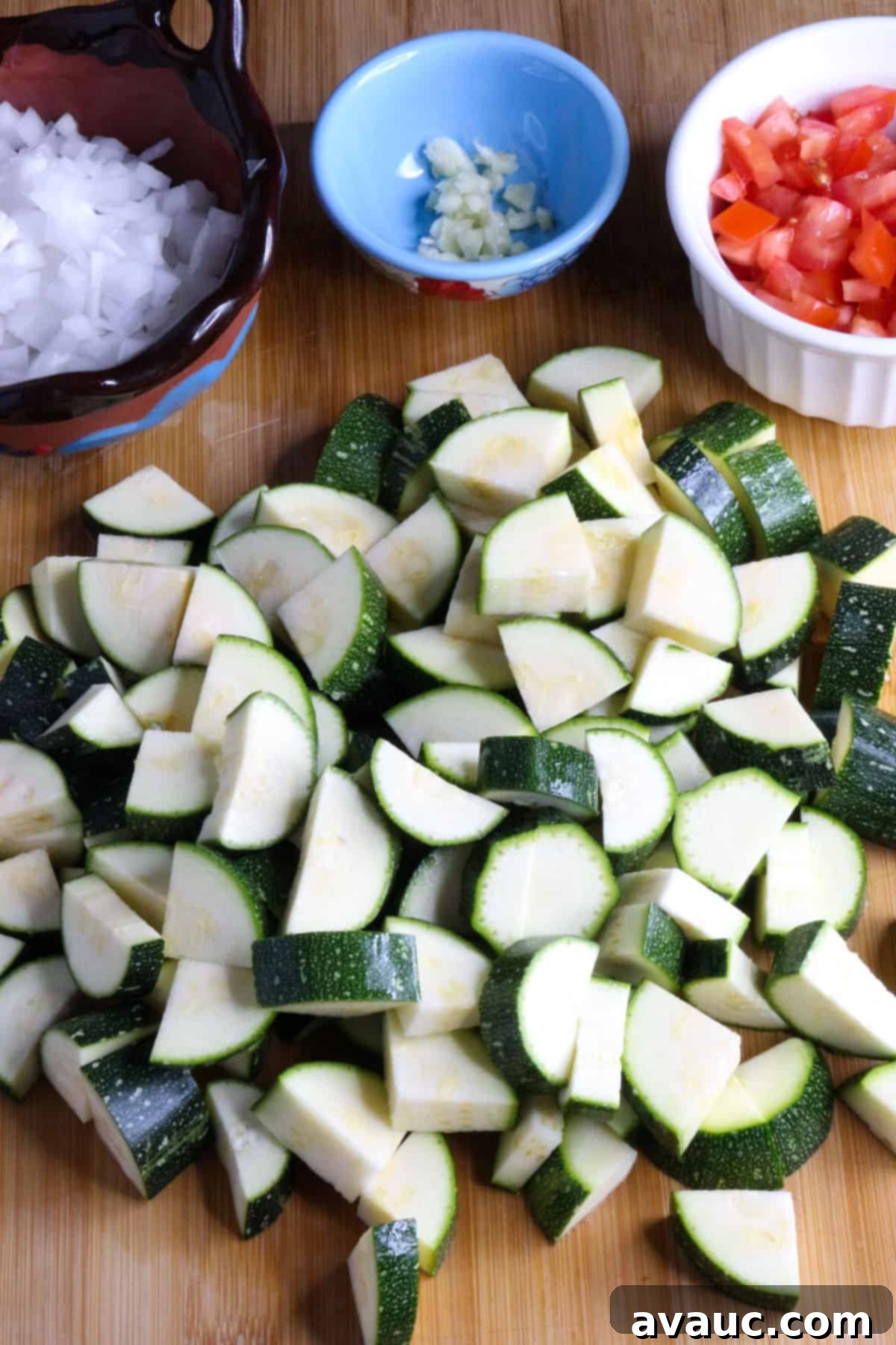 Cheesy Calabacitas 4 Finely diced zucchini, onion, garlic, and Roma tomato prepared for a delicious Calabacitas con Queso soup