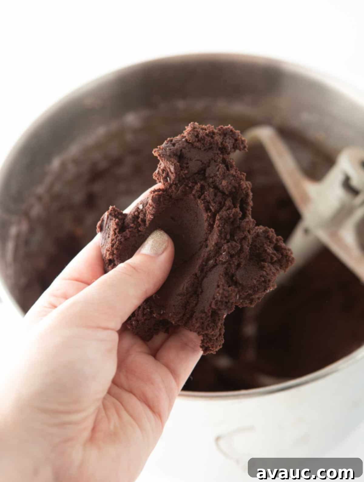 hand holiday andes mint cookie dough to show firm, thick texture