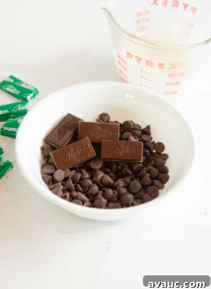 white bowl of chocolate chips and andes mint candies