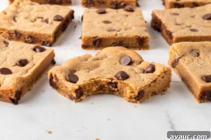 Chewy Peanut Butter Cookie Bars 3 peanut butter chocolate chip cookie bars with bite