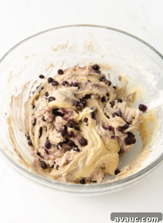Bite-Sized Blueberry Muffins 6 bowl of mixed blueberry muffin batter with frozen wild blueberries gently folded in