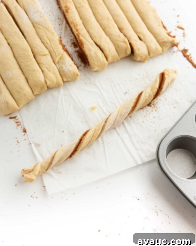 Effortless Cinnamon Swirl Knots 15 cinnamon roll dough twisted into strip