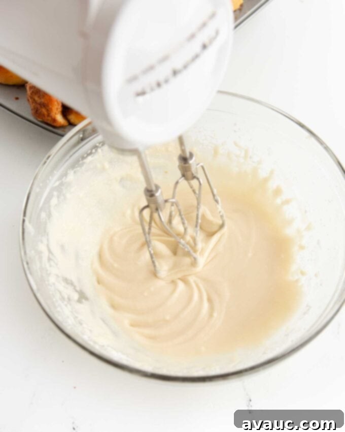 Effortless Cinnamon Swirl Knots 20 bowl of cinnamon roll icing