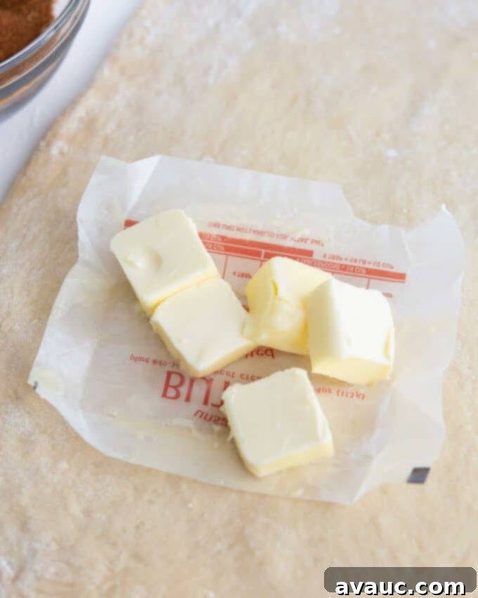 Effortless Cinnamon Swirl Knots 9 softened butter squares on wrapper