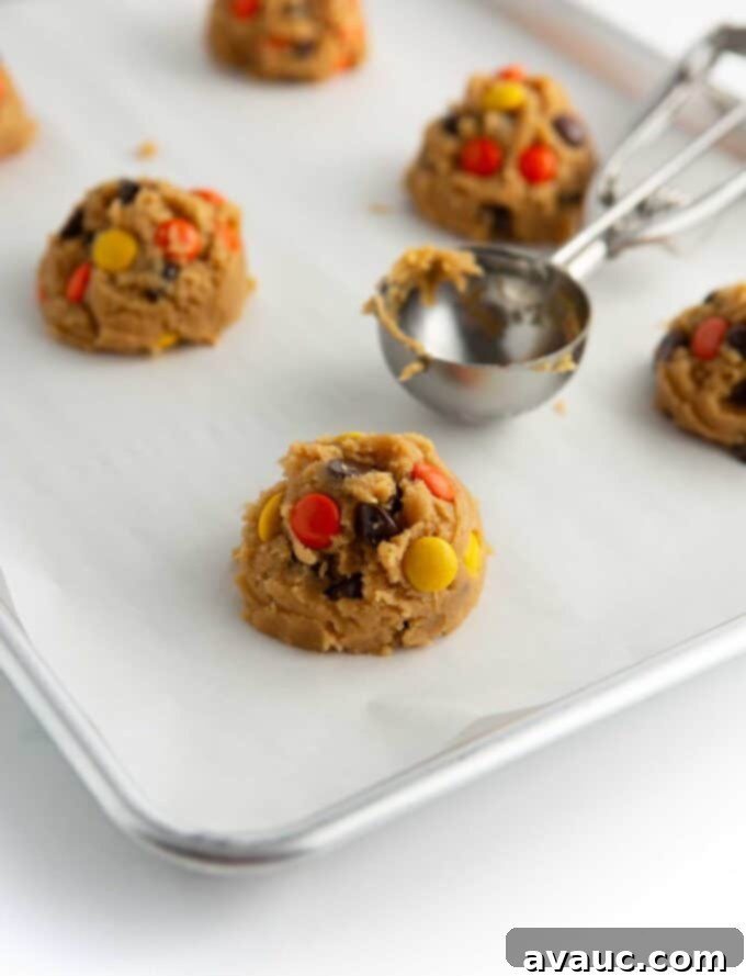 Chewy Reese's Pieces Perfection 7 scoop of reeses pieces cookie dough on baking tray