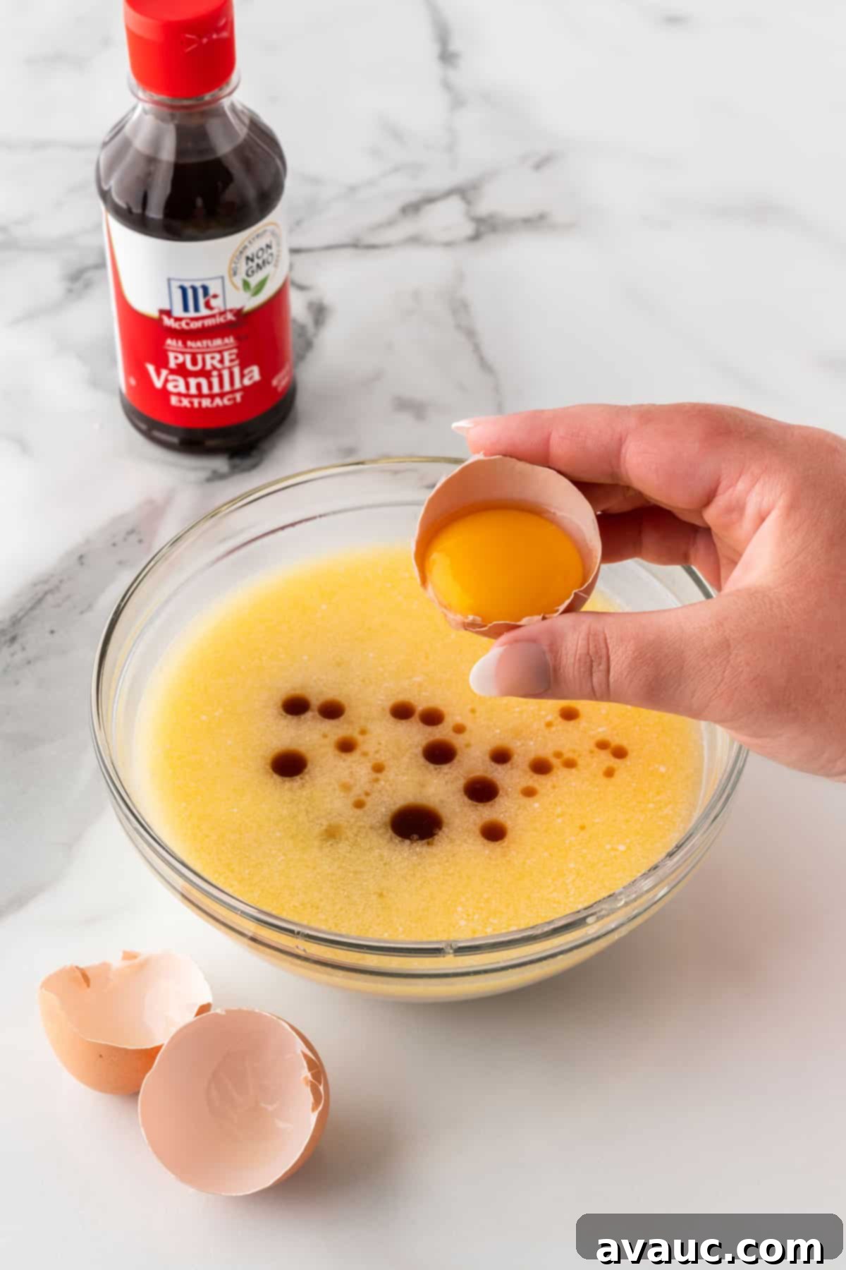 Sweet Morning Chocolate Chip Waffles 7 Separating egg yolk from egg whites for homemade crispy waffles.