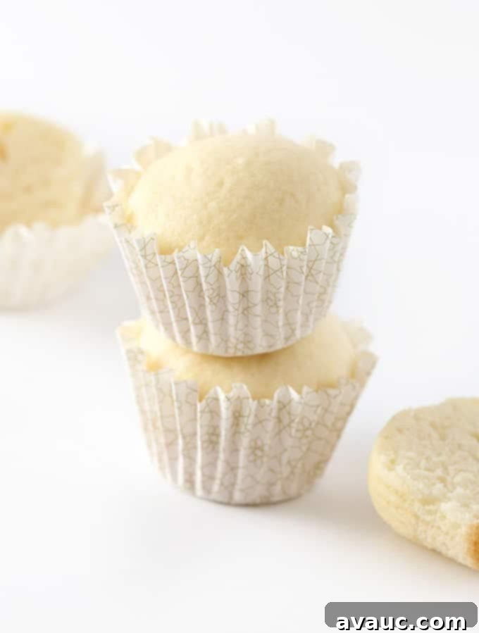 These white wedding cupcakes turn a boxed cake mix into the most amazing vanilla cupcakes you've ever had.
