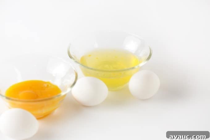 Separating egg whites and egg yolks for white wedding cupcakes