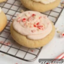 Festive Frosted Peppermint Sugar Cookies 14 A beautifully frosted peppermint sugar cookie, ready to be enjoyed.