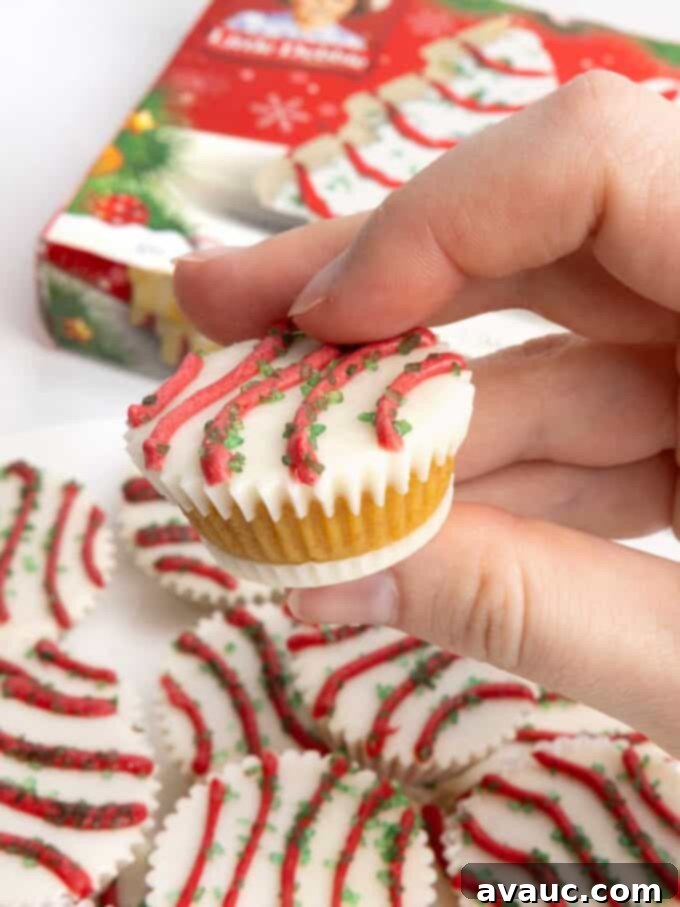 Festive Cakelet Cups 2 Cake ball in a mini muffin tin that does not require dipping. Decorated as Little Debbie Christmas tree cake