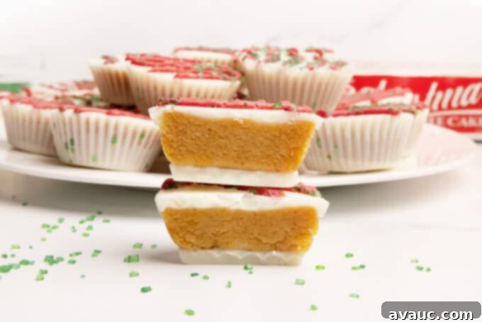 Festive Cakelet Cups 3 Yellow cake bite in a mini muffin tin that does not require dipping. Decorated as Little Debbie Christmas tree cake