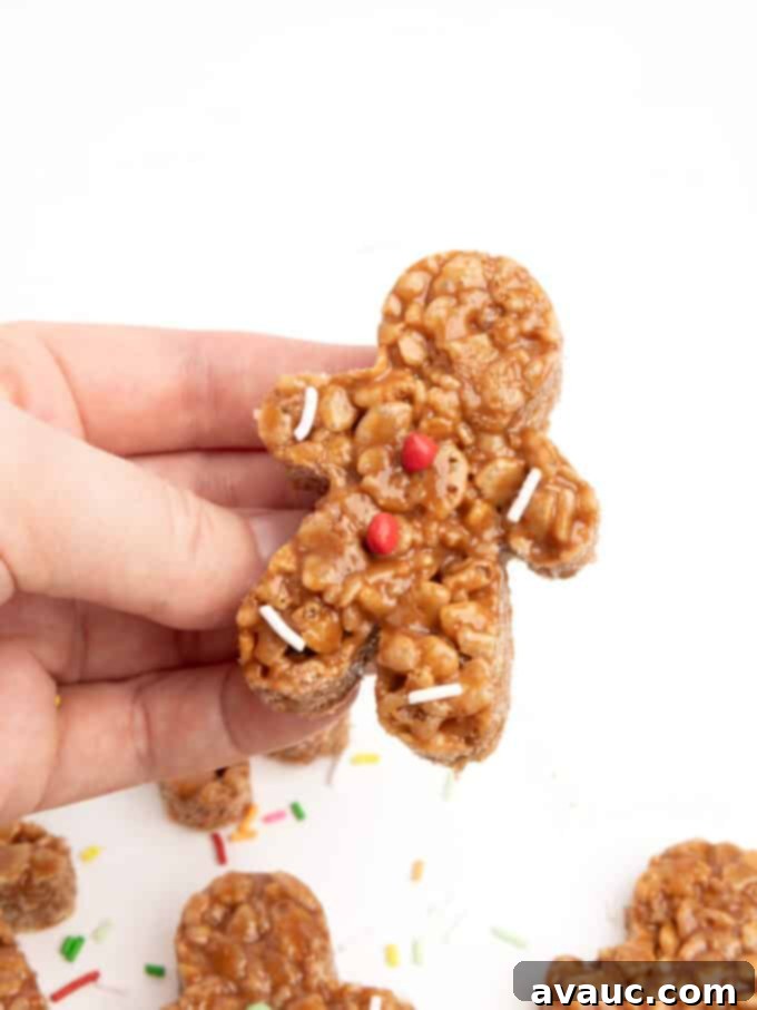 Spiced Gingerbread Krispie Treats 16 A plate of mini gingerbread star crunch rice krispy bars, decorated with sprinkles