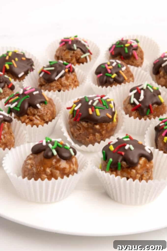 Spiced Gingerbread Krispie Treats 17 A plate filled with star crunch rice krispy Christmas balls and cut-out shapes, showing versatility