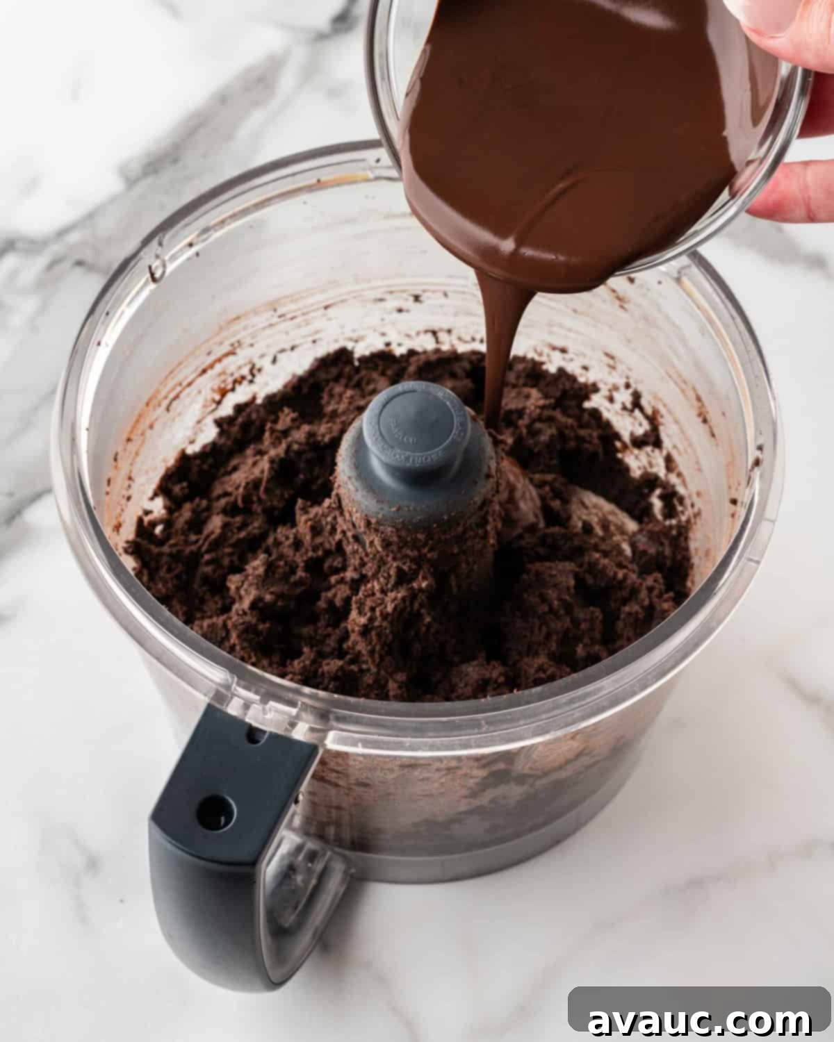 No-Dip Oreo Truffles 7 Melted dark chocolate cooling in a bowl before being added to the Oreo mixture.