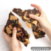 Christmas Nutty Buddy Bark 12 Nutty Buddy bark with visible layers of chocolate, peanut butter, and waffle cones.