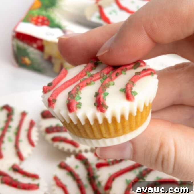 Little Debbie Festive Treats Collection 4 Cake ball in a mini muffin tin that does not require dipping. Decorated as Little Debbie Christmas tree cake.