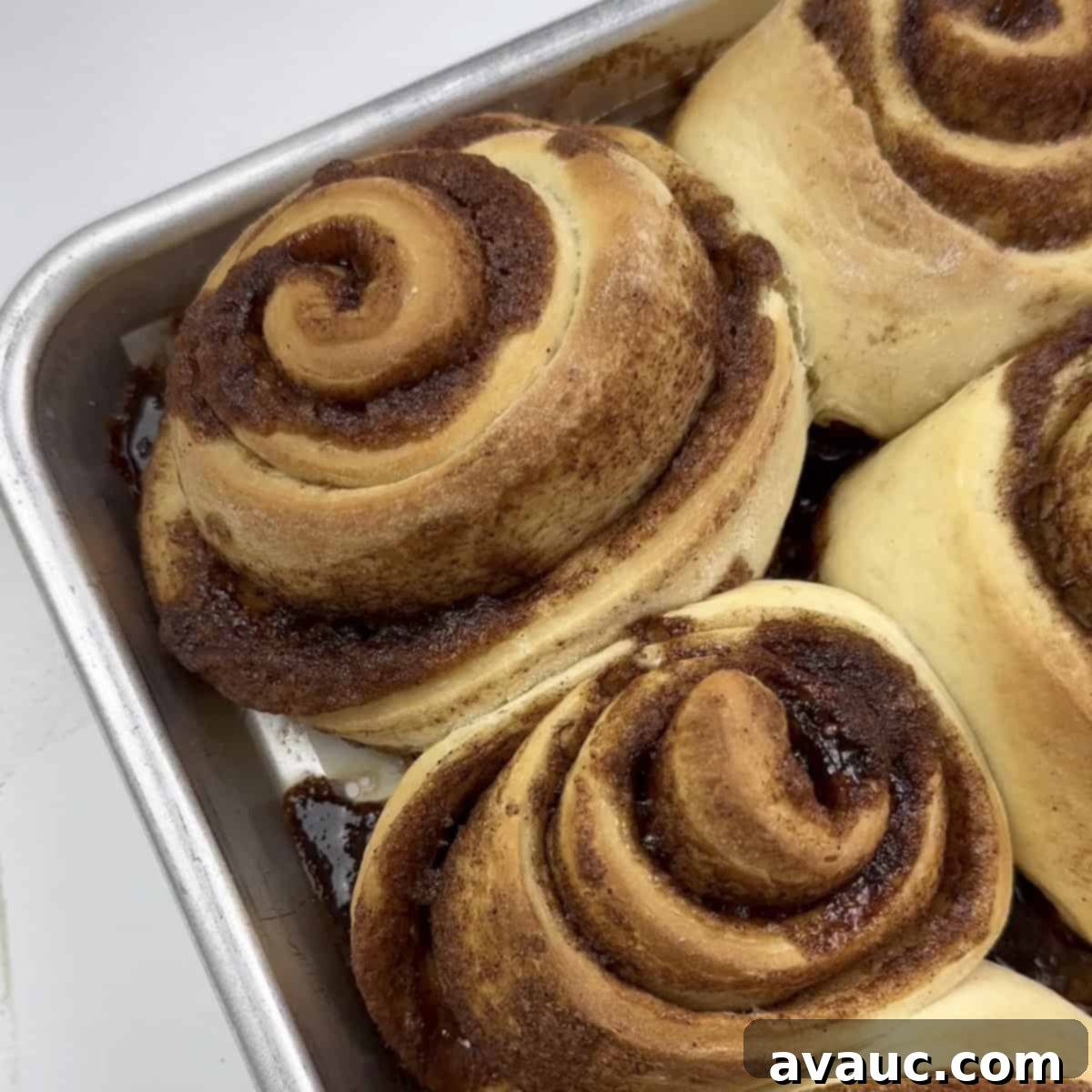 Freshly baked cinnamon rolls ready for freezing