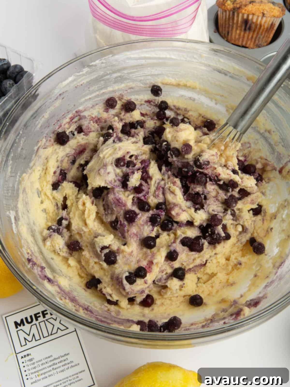 Whip Up Your Own Muffin Mix 8 Bowl of vibrant lemon blueberry muffin batter, ready for baking.