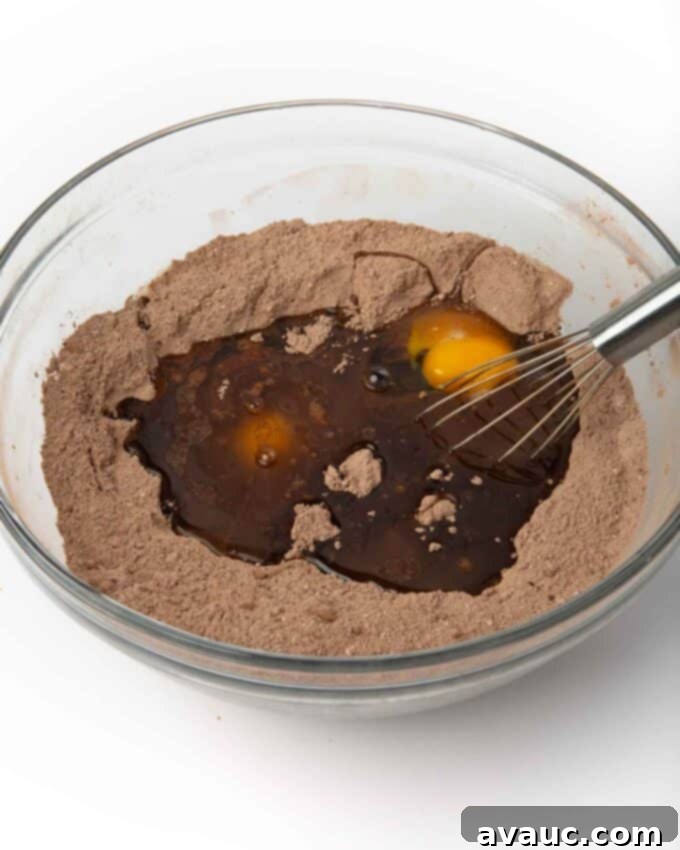 Irresistible Fudgy Brownies from Scratch 6 bowl of unmixed fudgy brownie batter, with wet ingredients just added to dry
