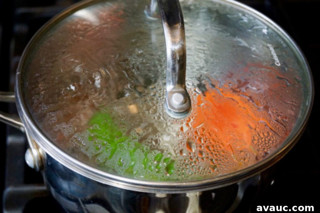 Boiling jalapeños and tomato for salsa base. #easysalsa #mexicansalsa #jalapenosalsa