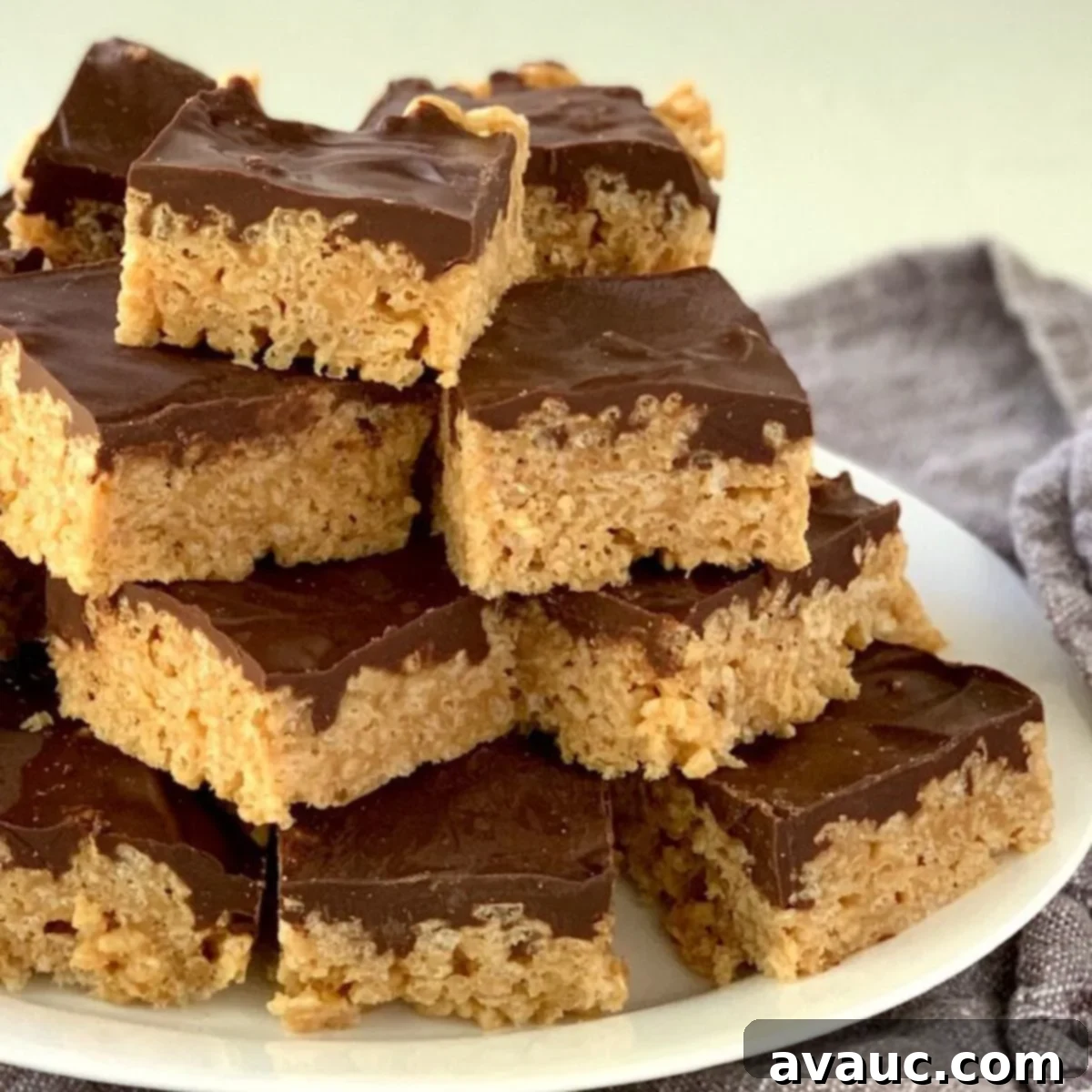 Classic Oh Henry Bars 4 A plate of gluten free Oh Henry Bars, perfectly cut and layered.