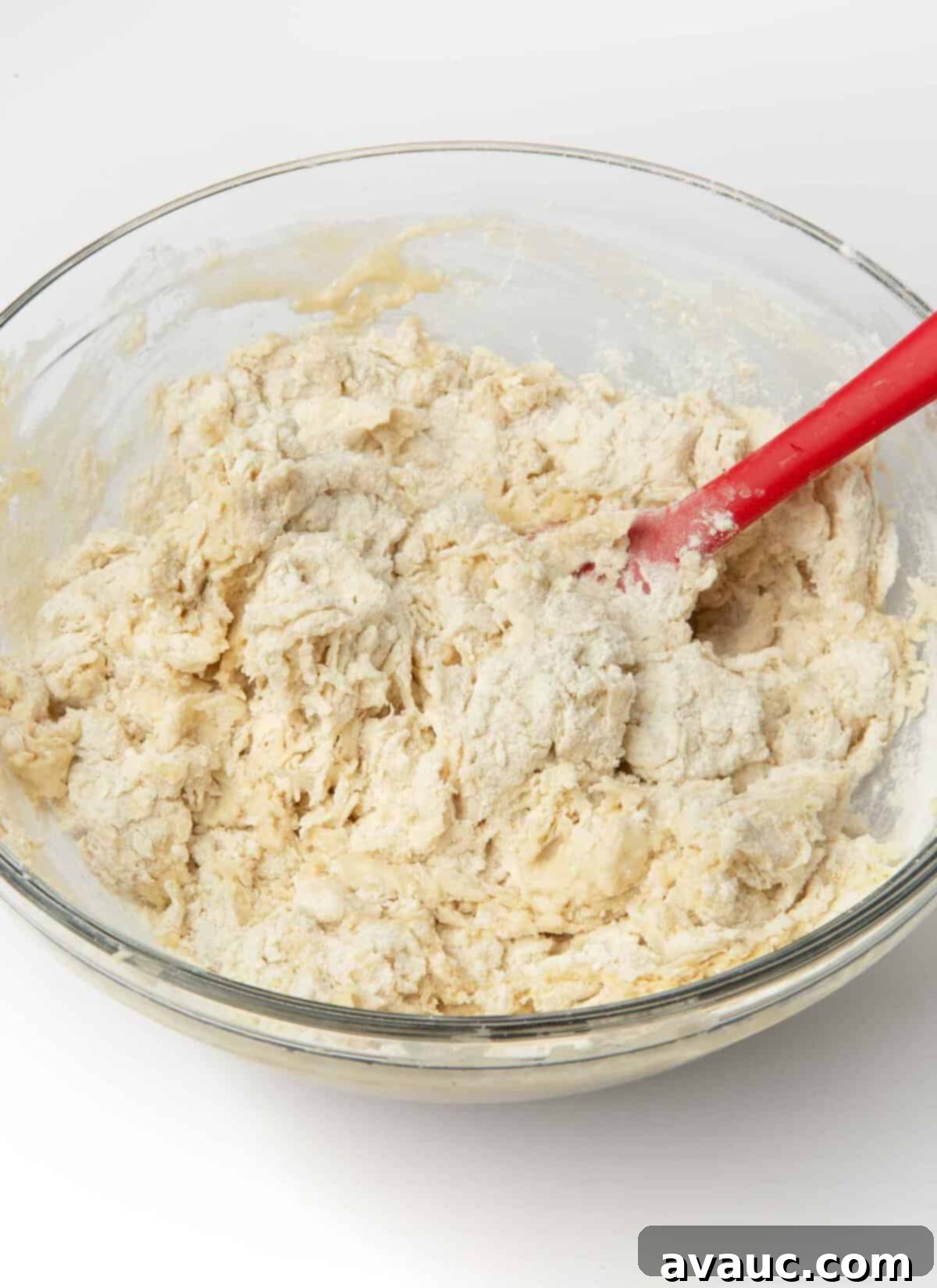 1-Hour Pizza Pretzel Twists 8 Dough mixture appearing shaggy in the bowl after initial mixing.