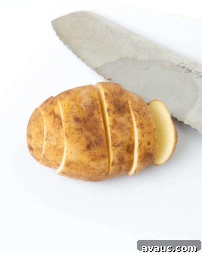 russet potato cut with knife