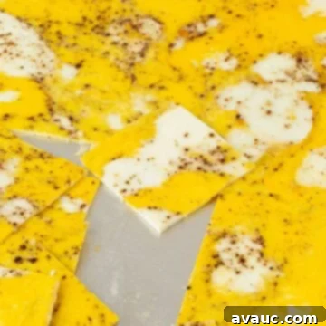 sheet pan eggs cut into squares on baking sheet