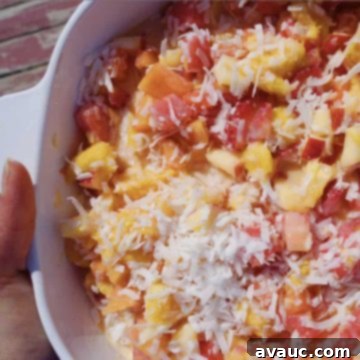 Indulgent Creamy Fruit Delight 5 Sweetened Condensed Milk Fruit Salad, ready to serve in a bowl, with coconut flakes