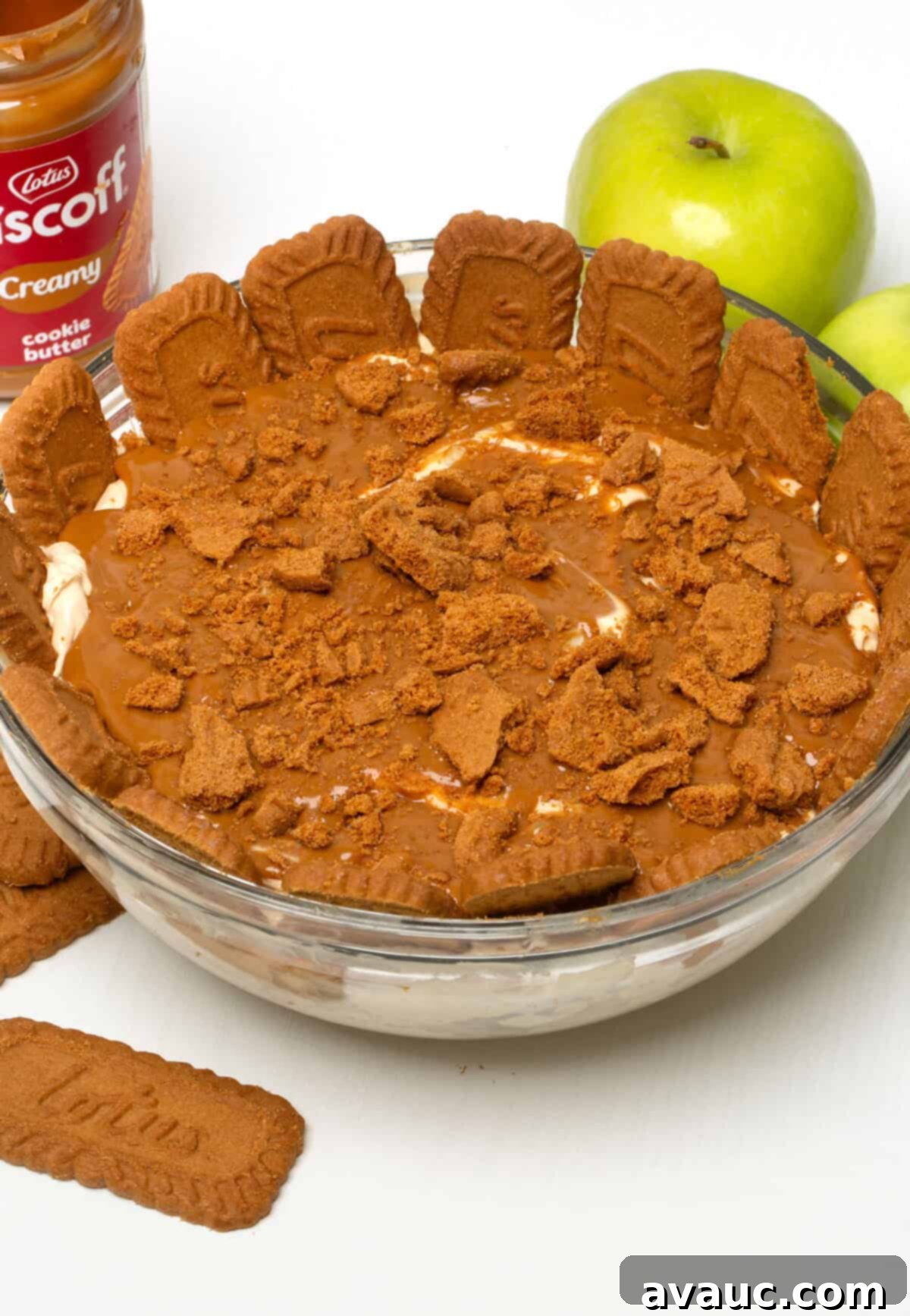 Caramel Apple Biscoff Delight 2 Delicious Caramel Apple Biscoff Salad, creamy and topped with crushed Biscoff cookies and caramel drizzle.