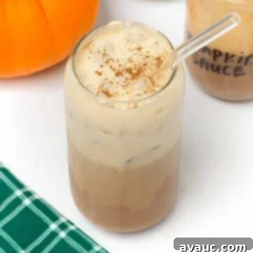 pumpkin cream cold brew in glass with straw