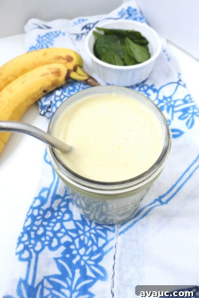 Creamy Almond Butter Banana Green Smoothie 4 Almond Butter Smoothie with spinach and banana, ready to drink. A healthy and quick breakfast or snack idea. #smoothie #smoothierecipe #almondbuttersmoothie
