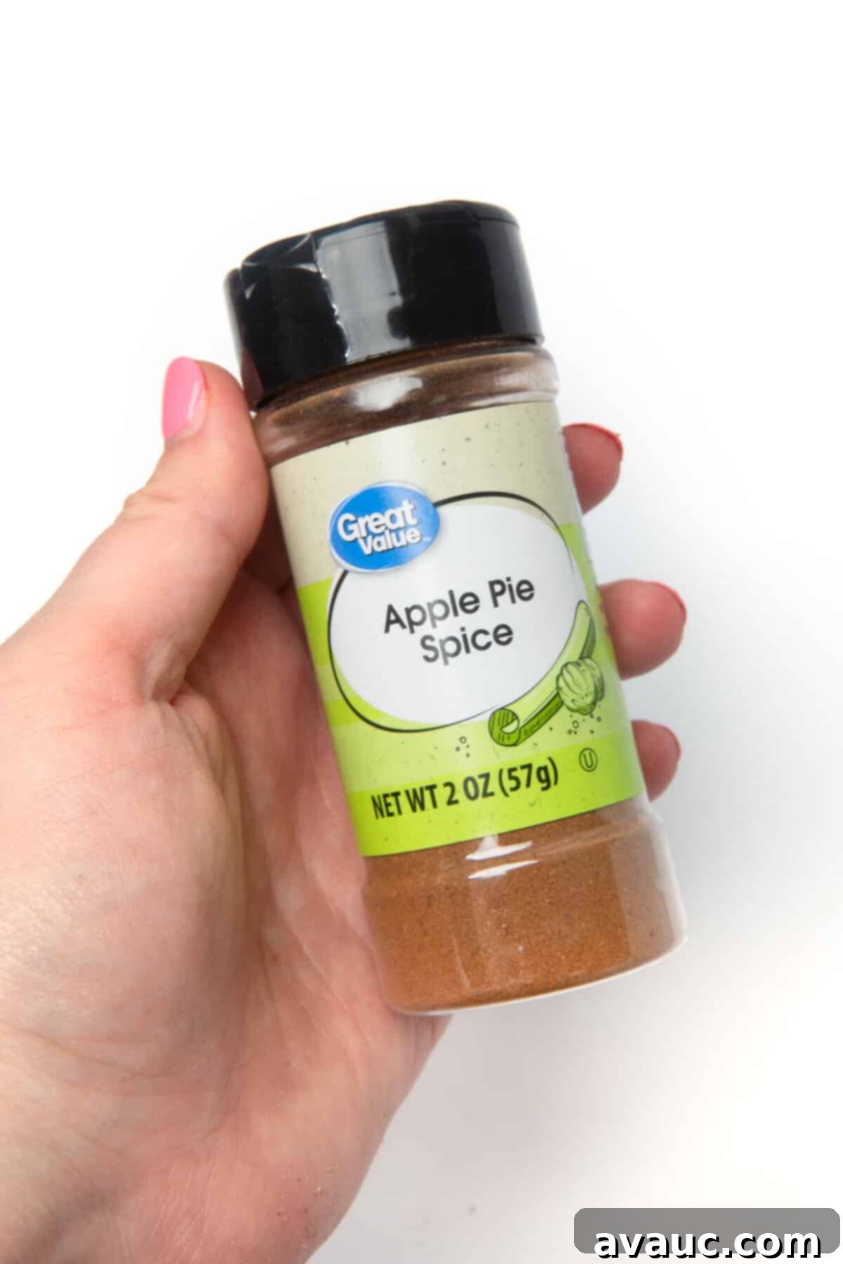 Quick Apple Cinnamon Rolls 4 apple pie spice bottle, highlighting the key ingredient for fall flavor