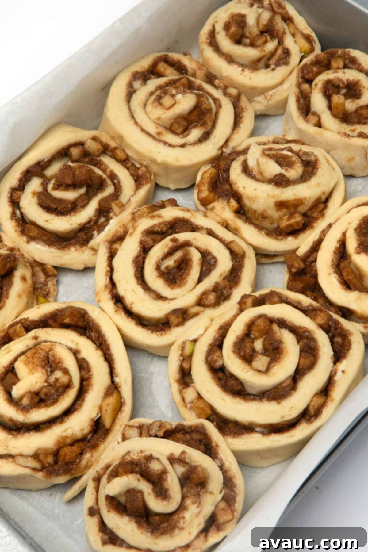 Quick Apple Cinnamon Rolls 9 pan of unbaked apple cinnamon rolls, ready for the oven